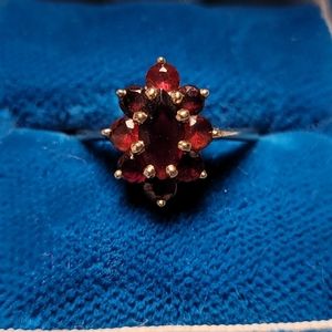 Imitation marquee halo garnet and gold ring.